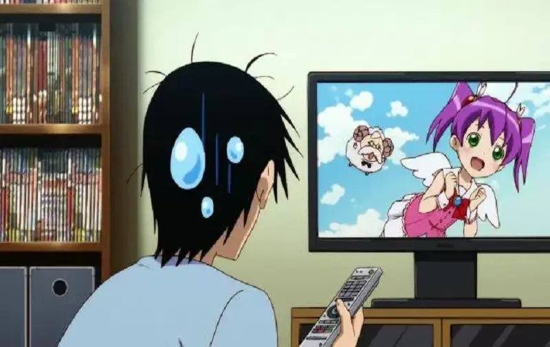 Menikmati anime secara online Seseorang menonton anime di laptopnya