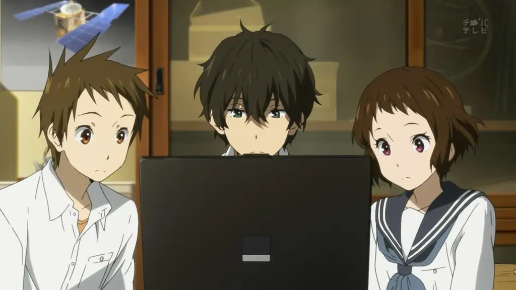 Menikmati anime sub indo dengan kualitas HD Seseorang menonton anime di laptop